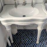 Set of a sink and its retro ceramic splashback.