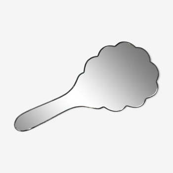 Beveled hand mirror.