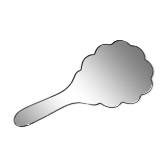 Beveled hand mirror.