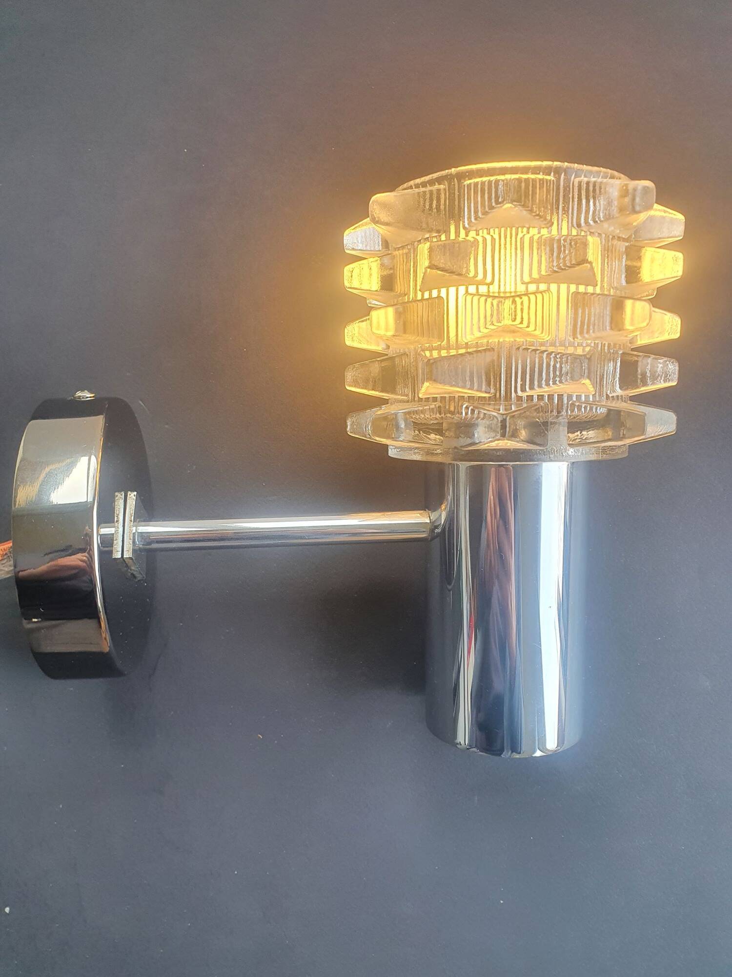 Pair of vintage 1970s chrome wall sconces.