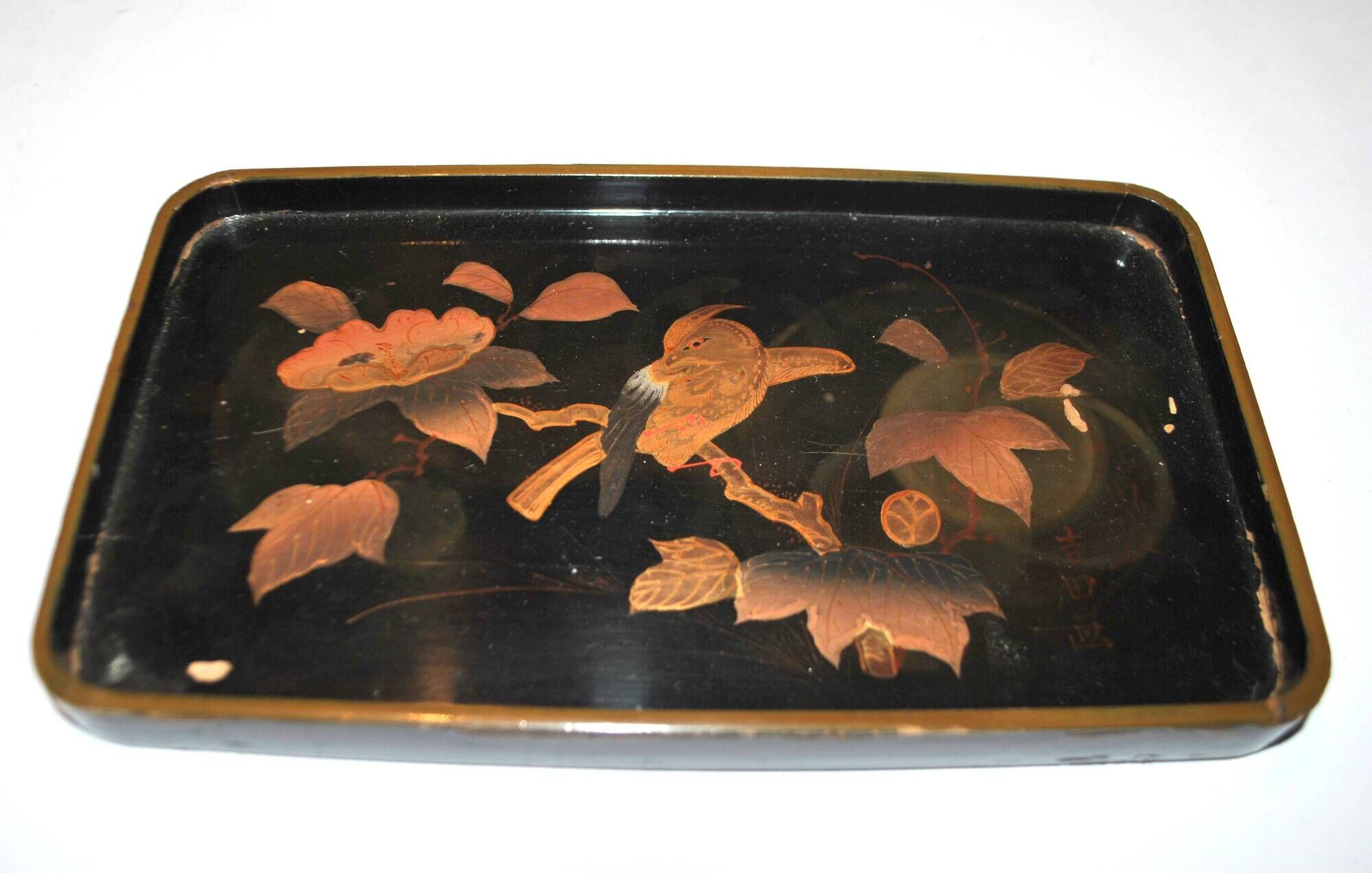 Set of two brown and black Chinese lacquer trays with bird decor
