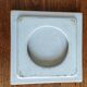 Yellow glazed ceramic trivet signed l. drimmer