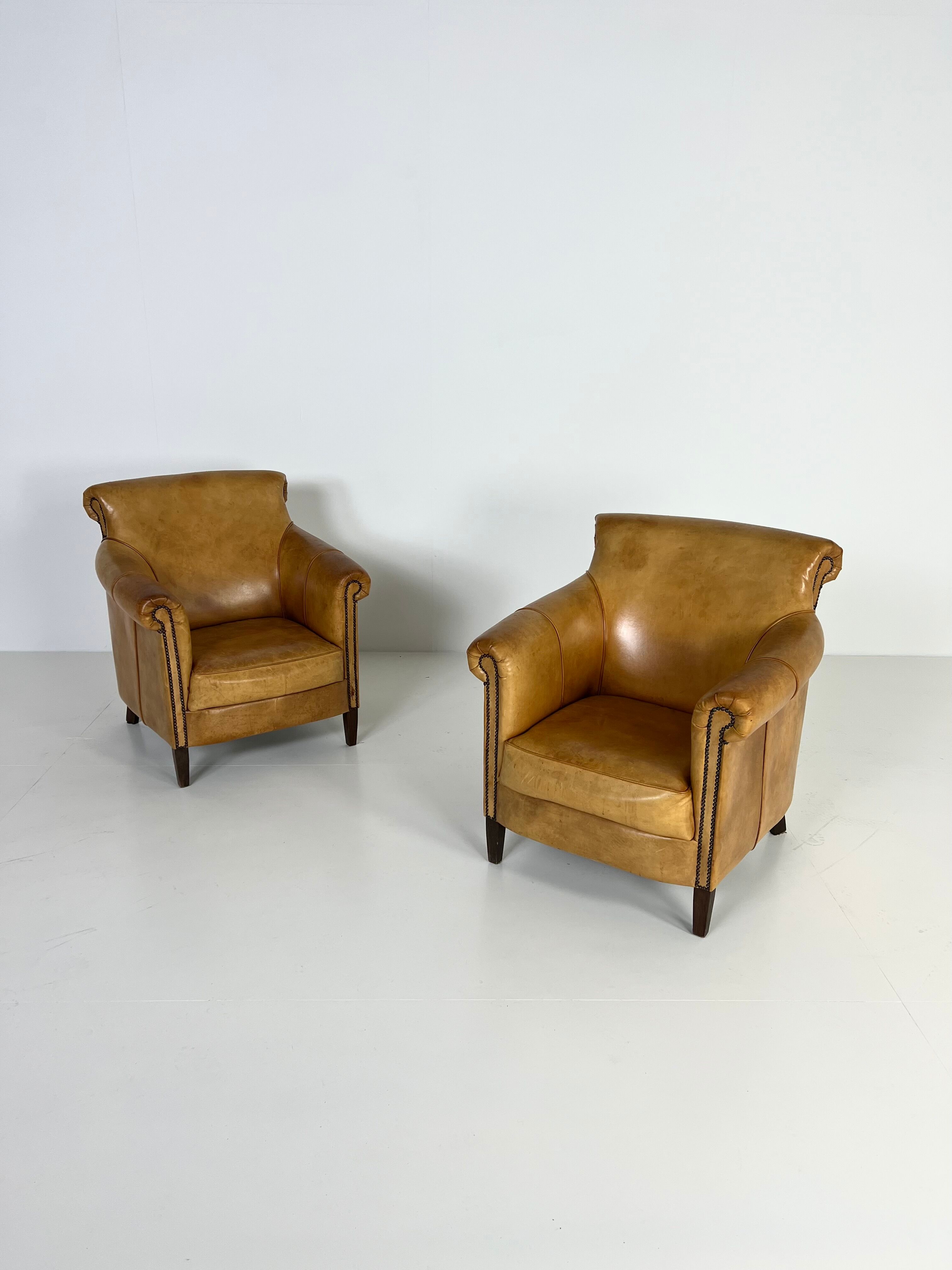 Ensemble de 2 fauteuils club en cuir