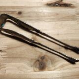 Old sugar or ice cube tongs