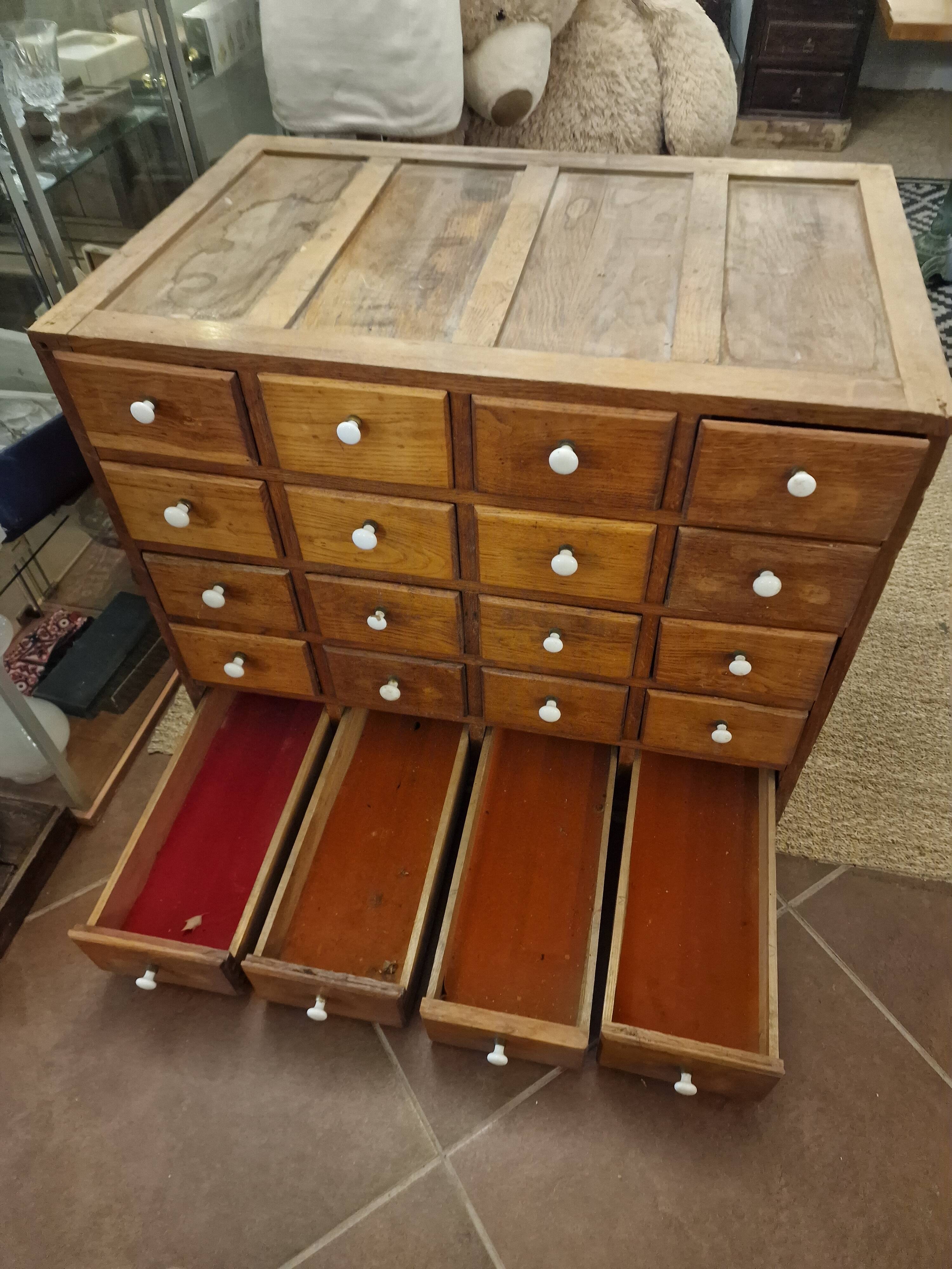 Antique craft cabinet with solid oak drawers and porcelain handles