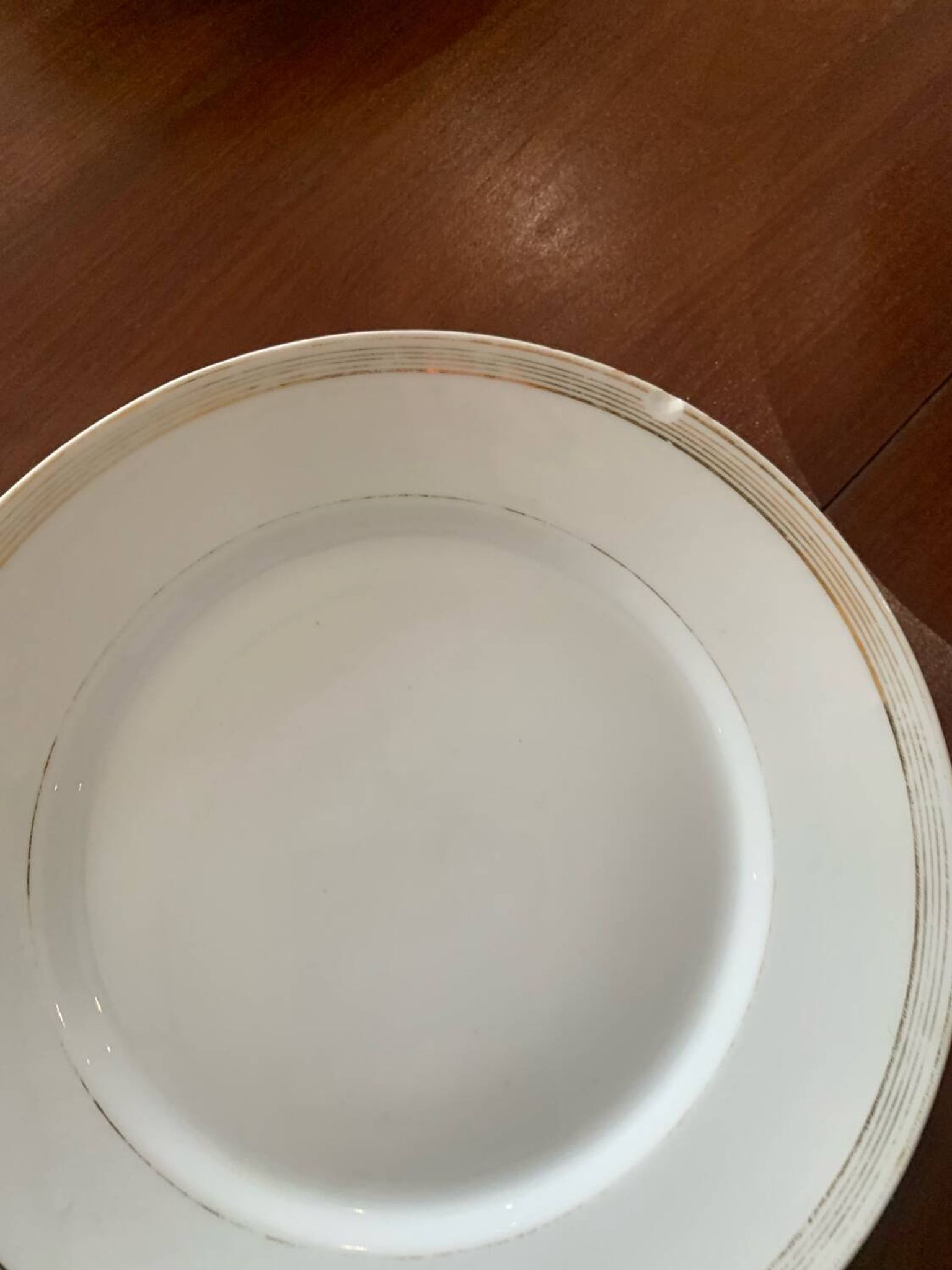 Lot of six flat plates, crockery, old white, gilded