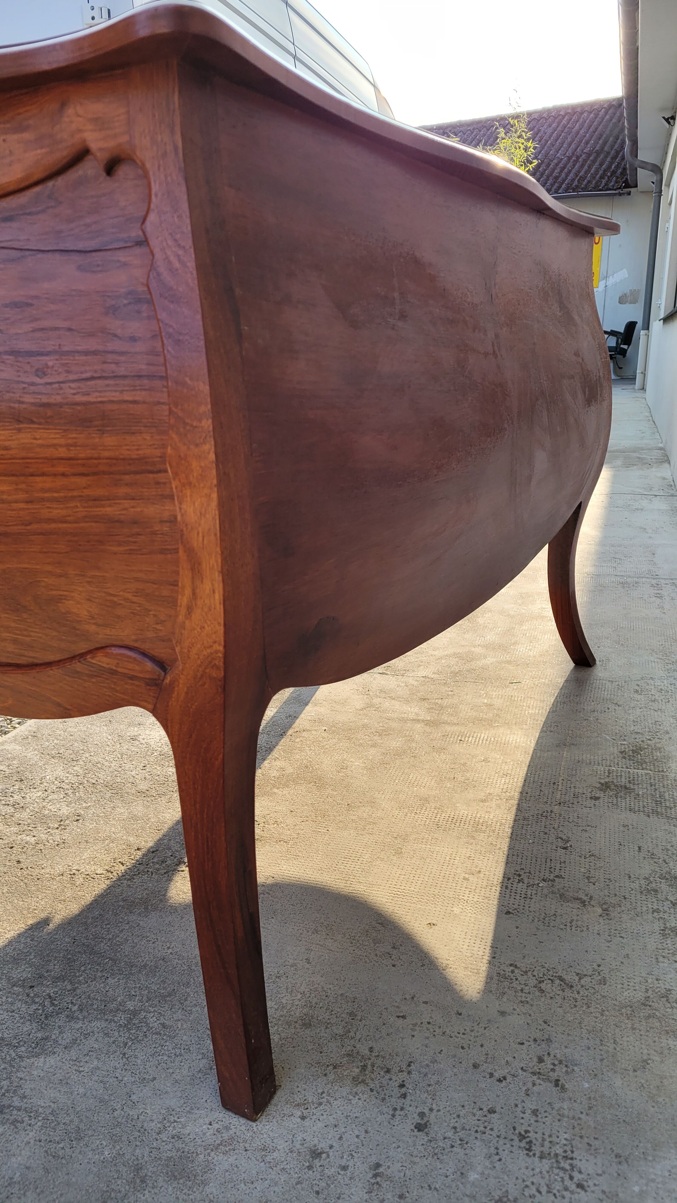 Curved Louis XV style commode in mahogany.