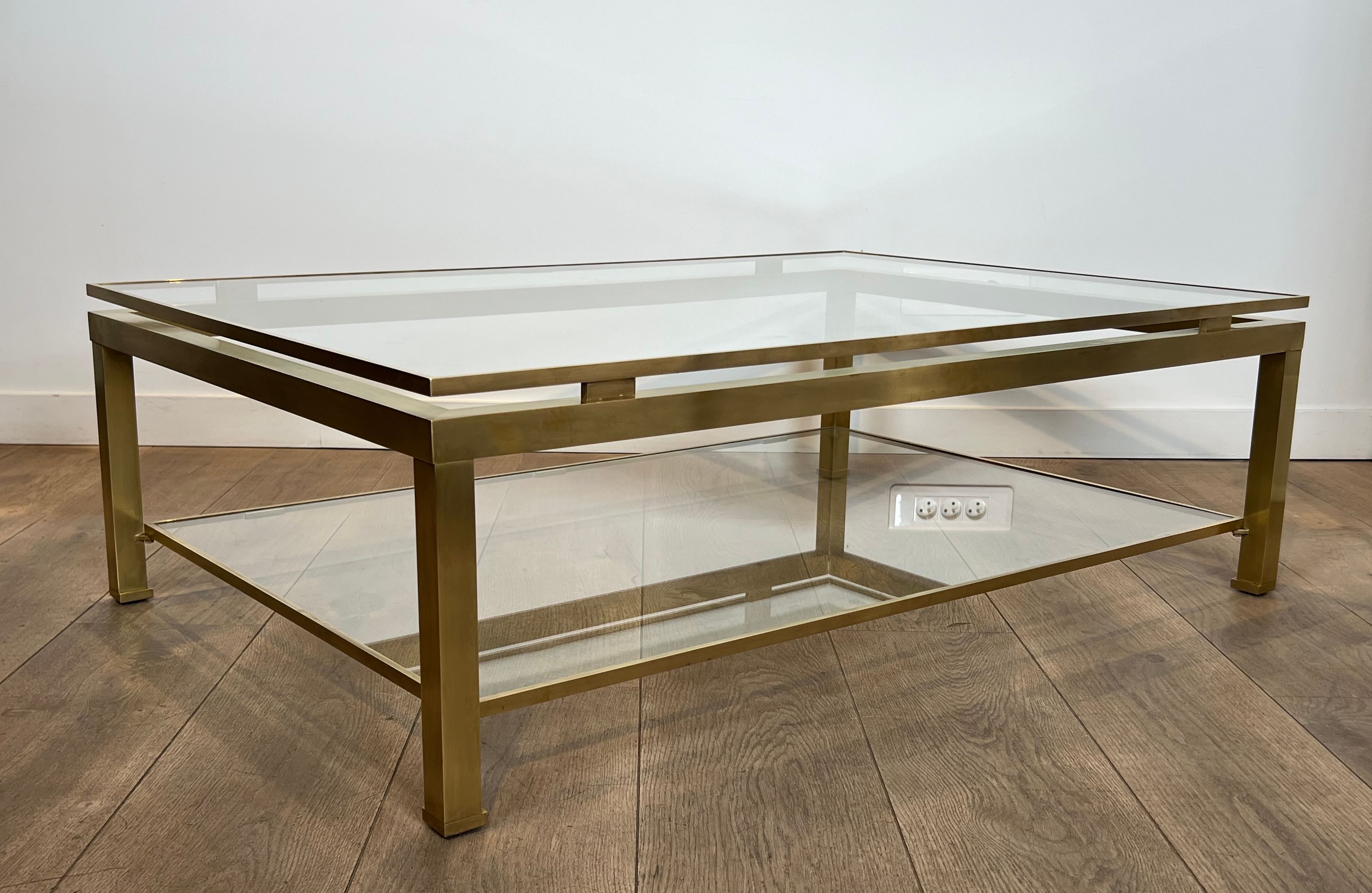 Modernist coffee table in brass and glass tops by Guy Lefèvre for Maison Jansen.