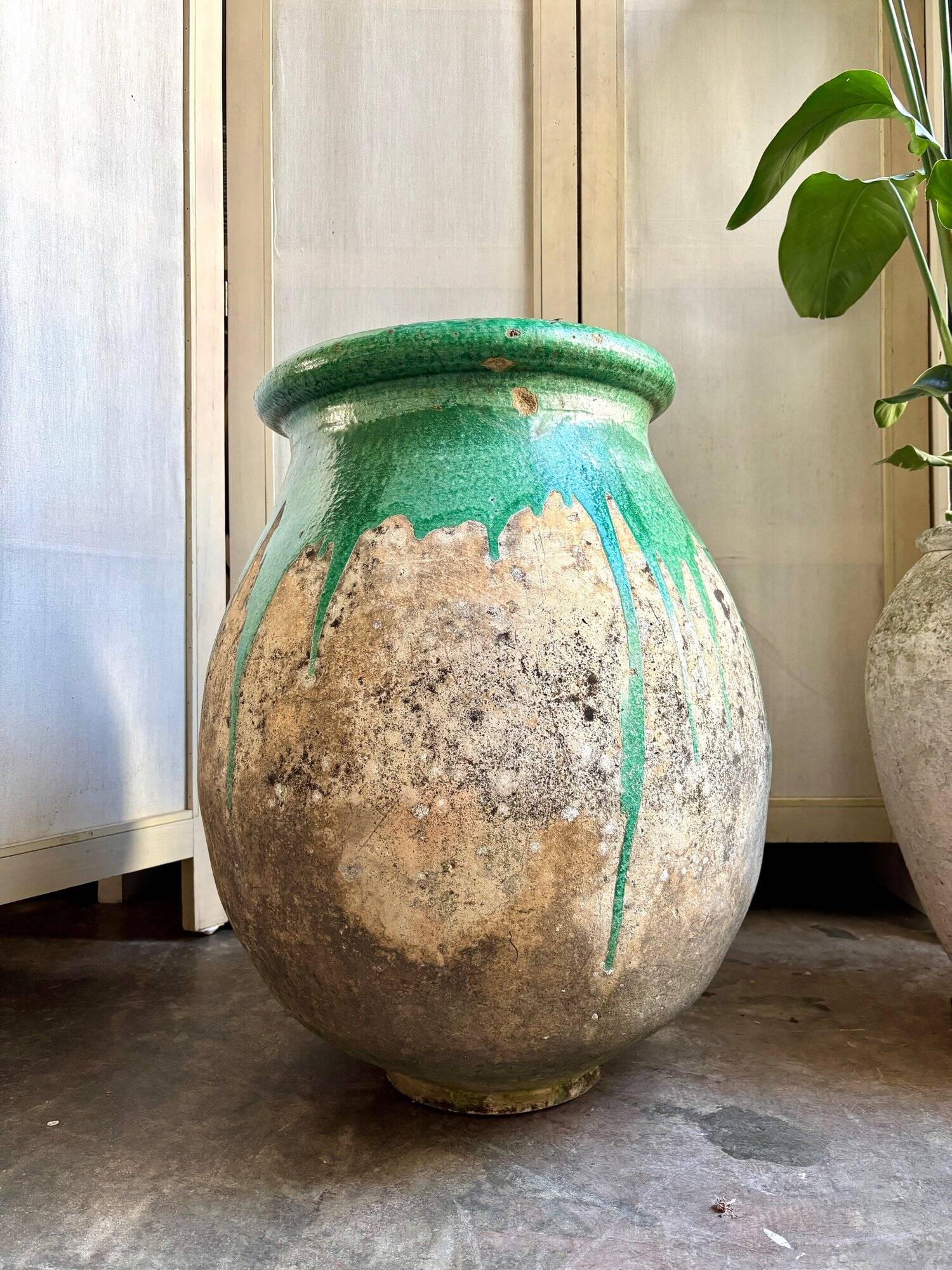 Biot jar, plant pot in beige and green glazed ceramic