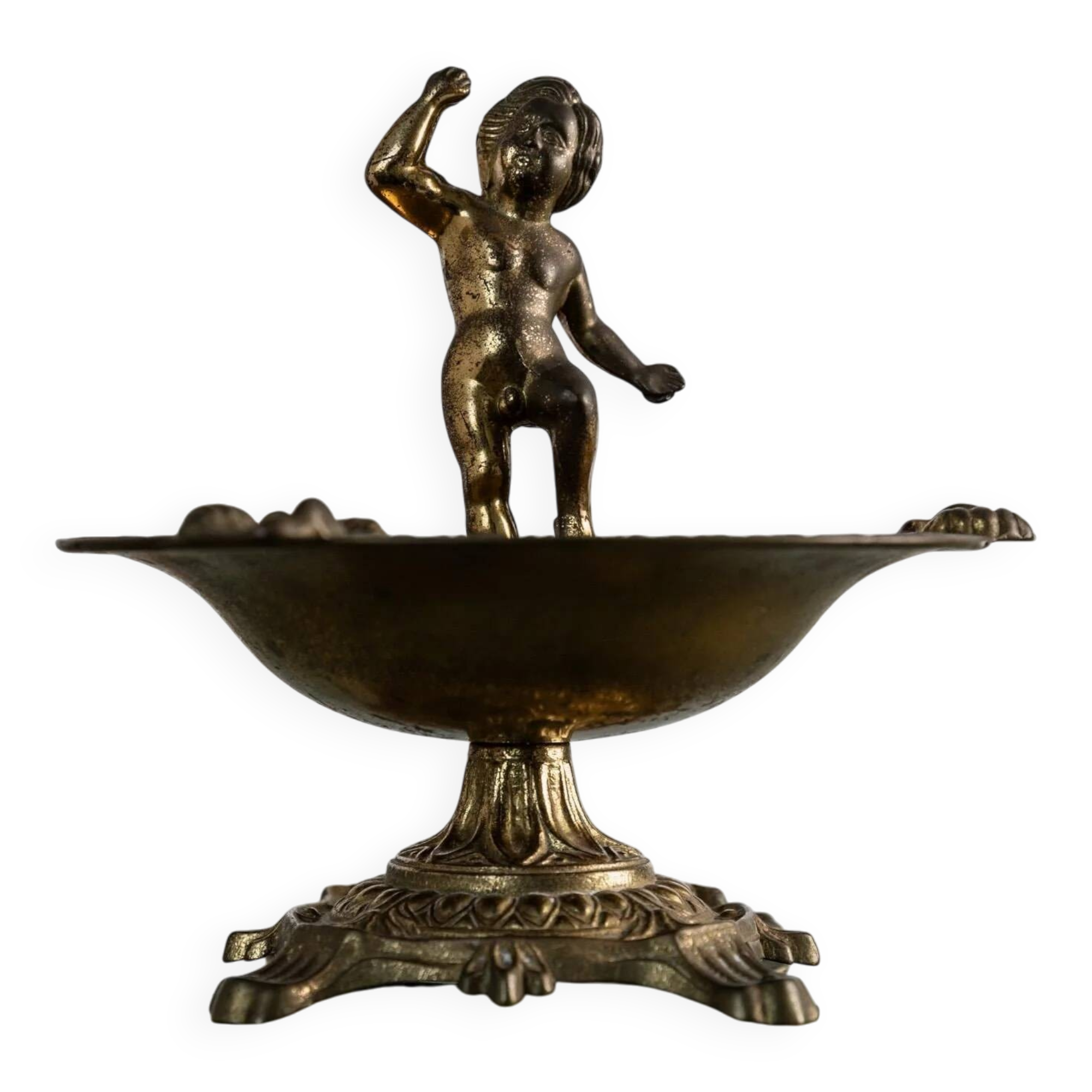 Vintage brass ashtray from the 1940s with a nude boy figurine on a footed base.
