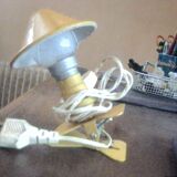 small old clamp light in good condition in sheet metal