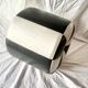 Vintage round pouf in black and white skai