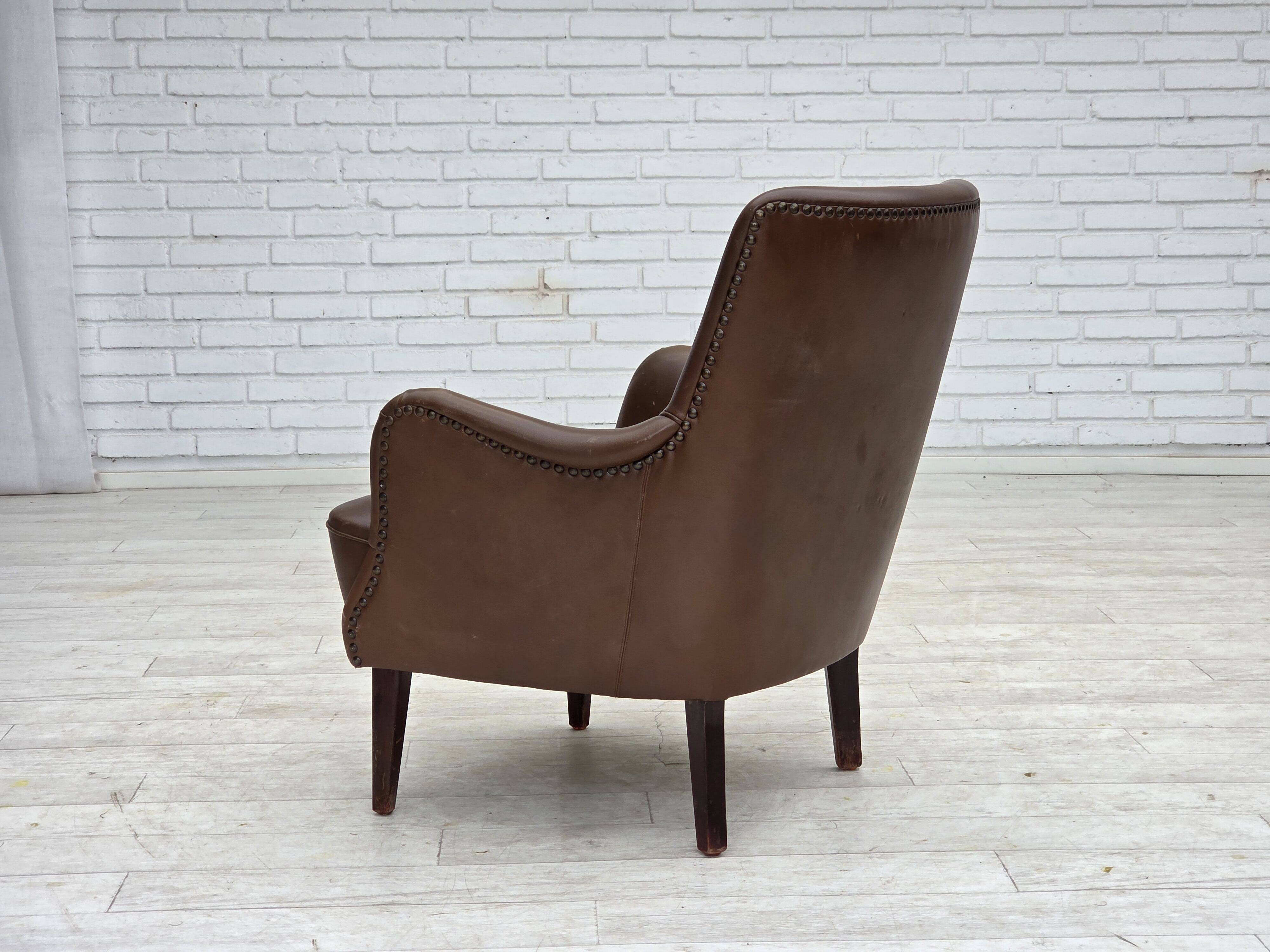 1960s, Danish armchair, furniture leather, ash wood legs.