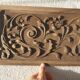 Paire de fronton, bas relief en bois sculpté