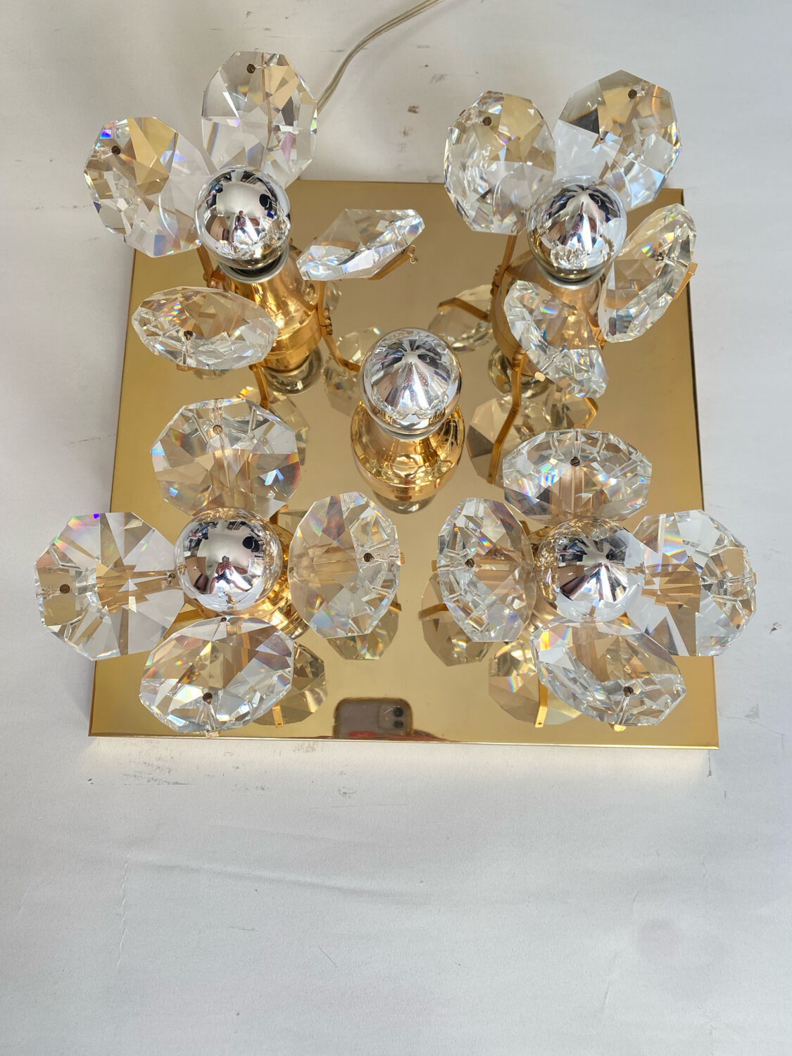 Brass wall lamp with glass prisms