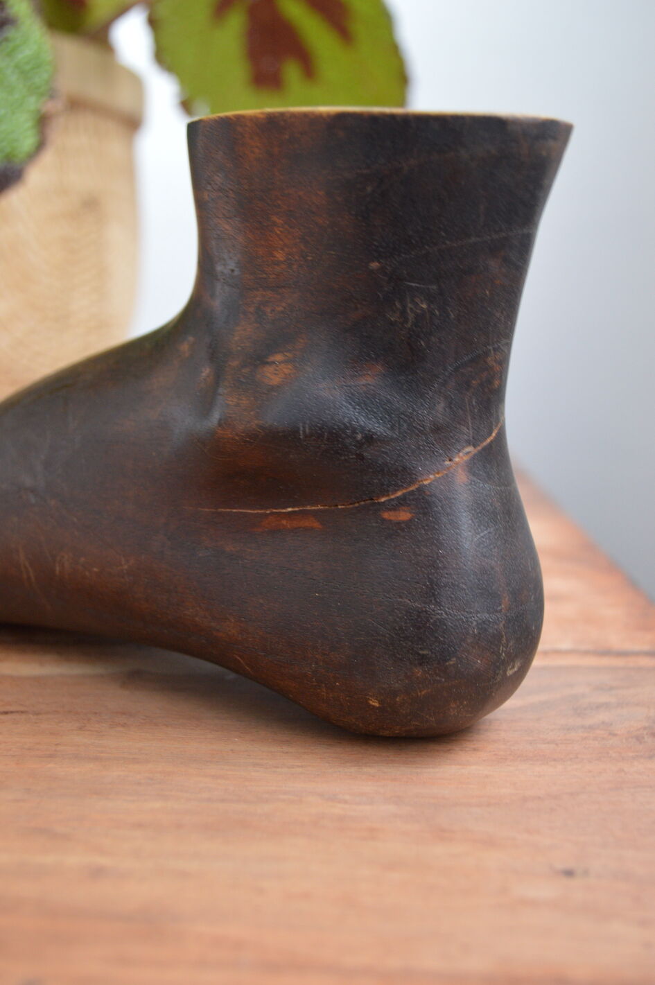 Carved wooden Buddha's foot
