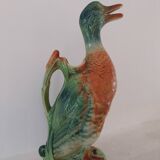 Water jug in slipware from the 1960s. Decorated with a coloured duck. Unmarked.