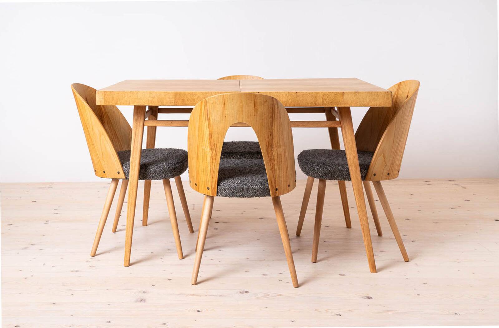 Dining table and 4 chairs by Antonin Šuman, restored.