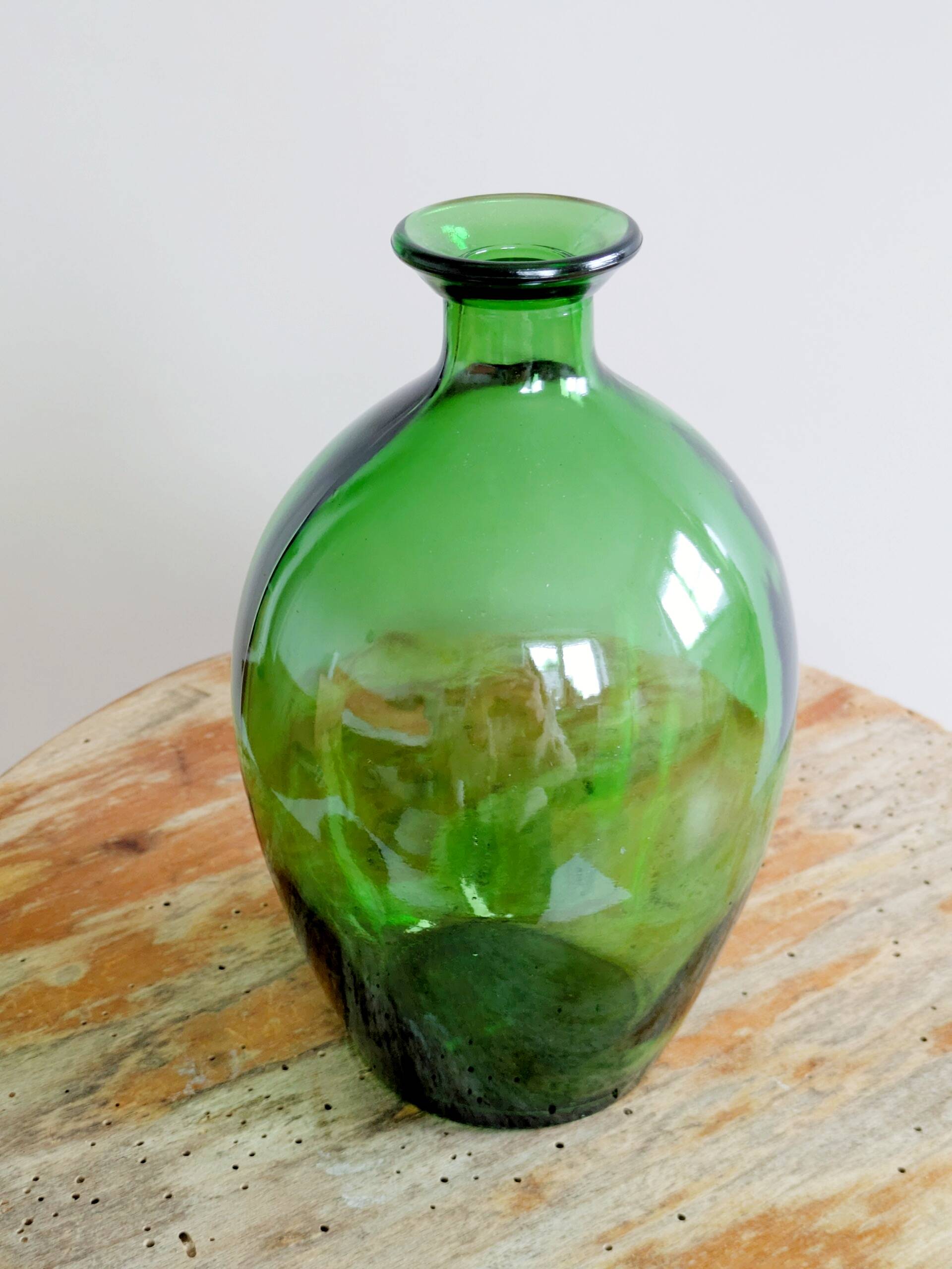 Vintage green glass bottle vase, decorative soliflore.