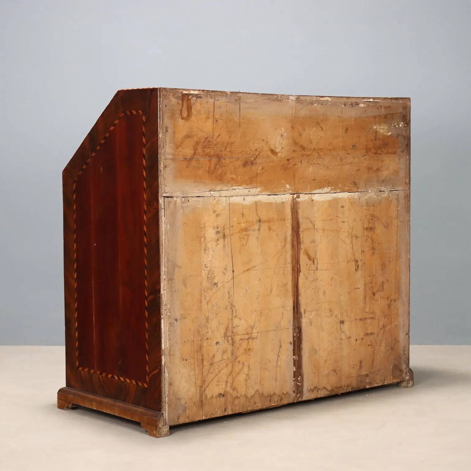 Antique drop-leaf cabinet in various types of wood, Italy, 18th century.