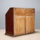 Antique drop-leaf cabinet in various types of wood, Italy, 18th century.