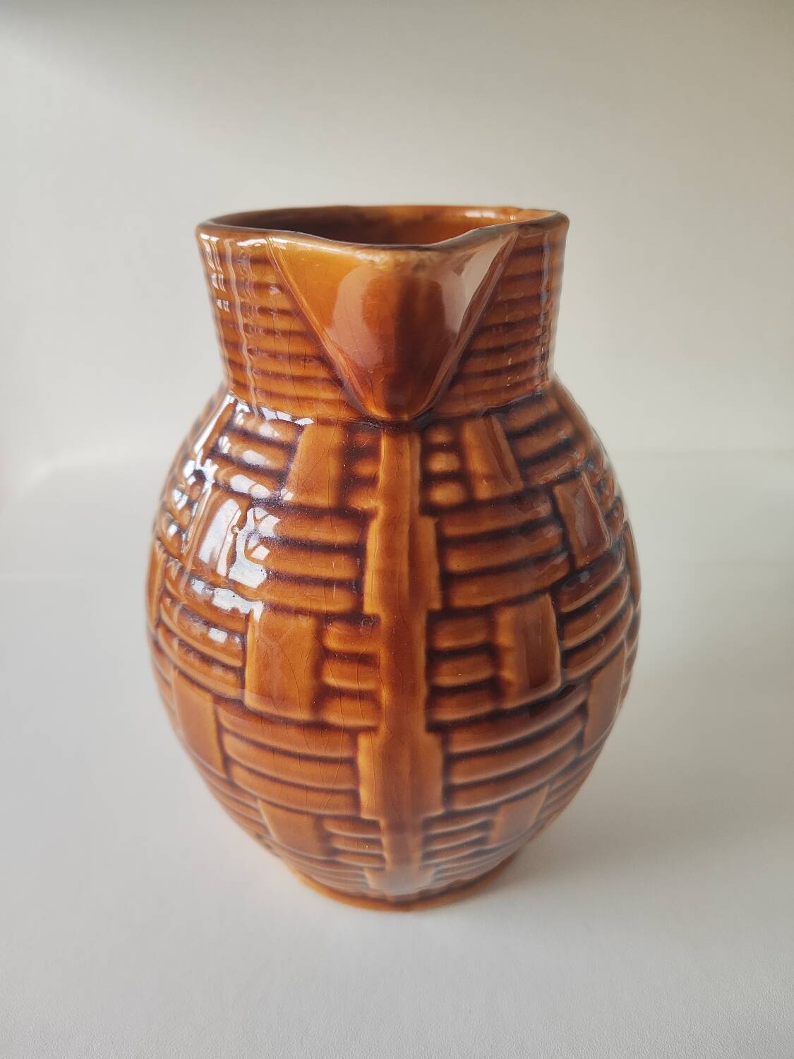 Caramel brown pitcher in glazed ceramic with barbotine finish from the 60s