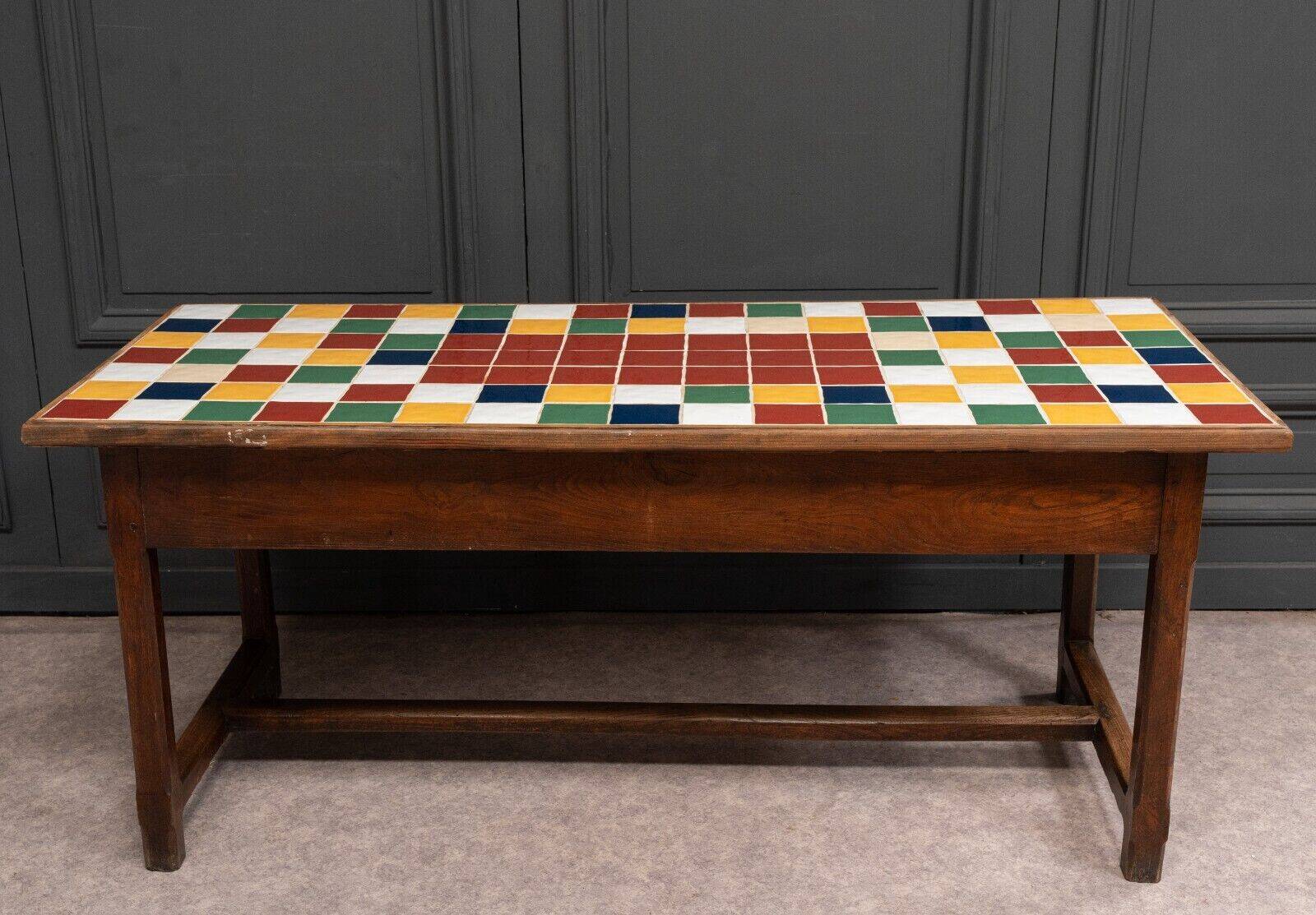 19th century oak farm table with multi-colored ceramic tiles