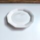 Round vintage Niderviller plate with a country decor.