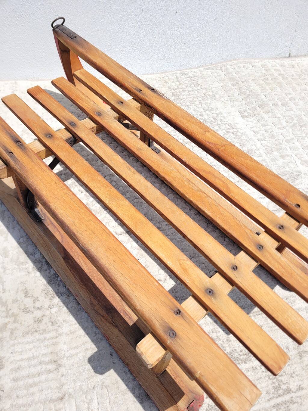 Antique wooden sled with metal runners