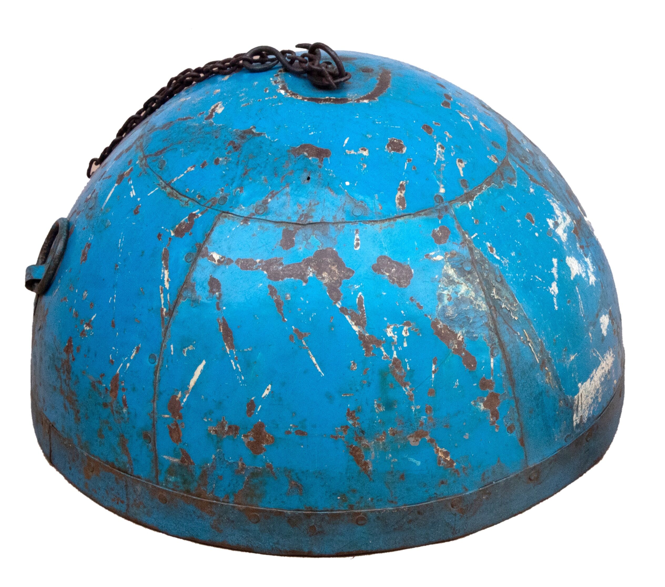 Metal hanging with its original blue colour