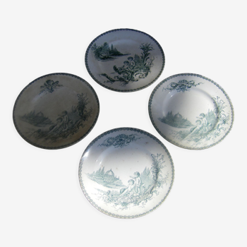 Four antique earthenware plates