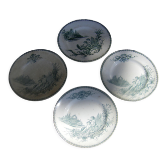Four antique earthenware plates
