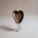 Heart-shaped pocket emptier