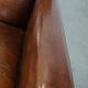 Cognac-colored sheep leather Art Deco design armchair finished with piping