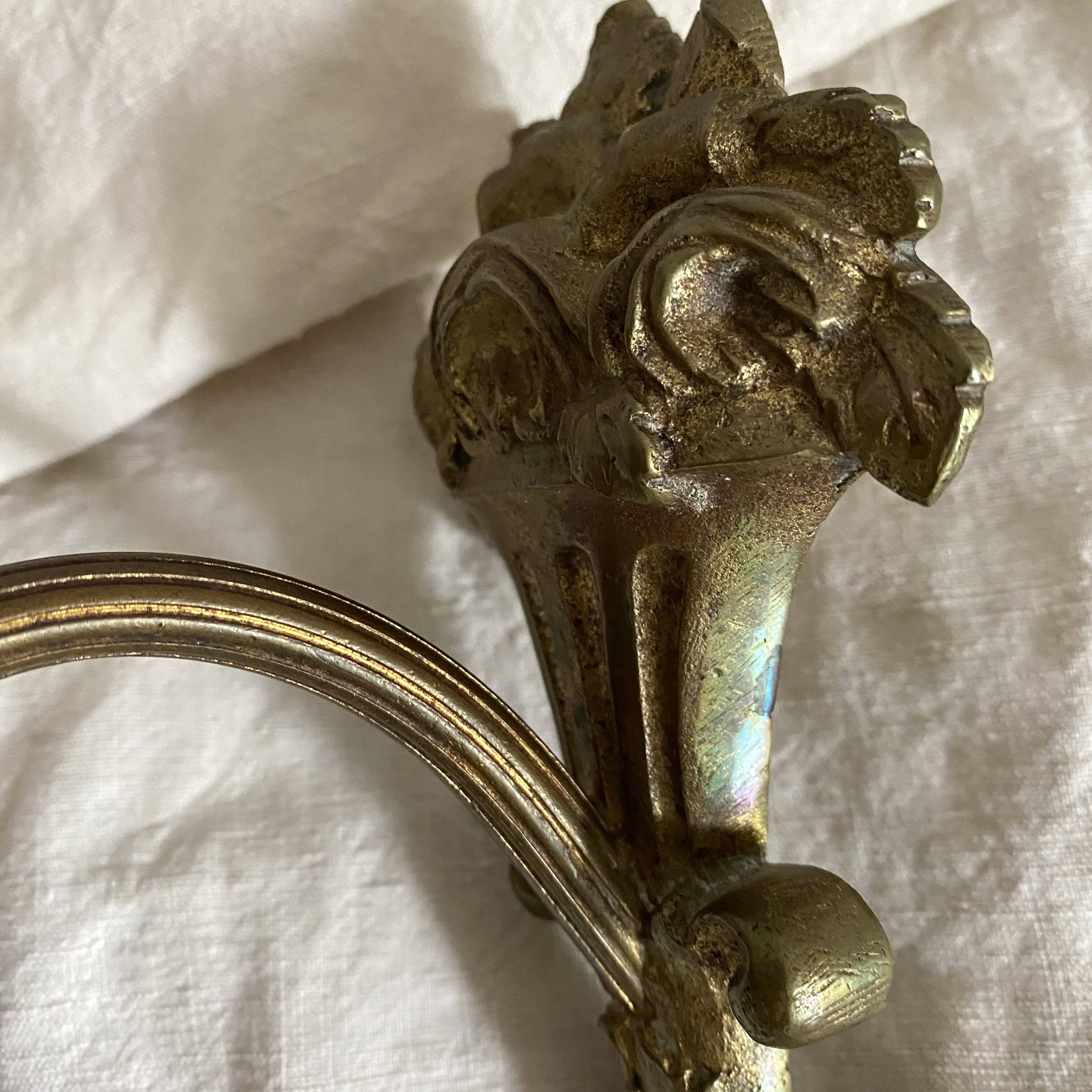 Antique bronze and glass paste wall light