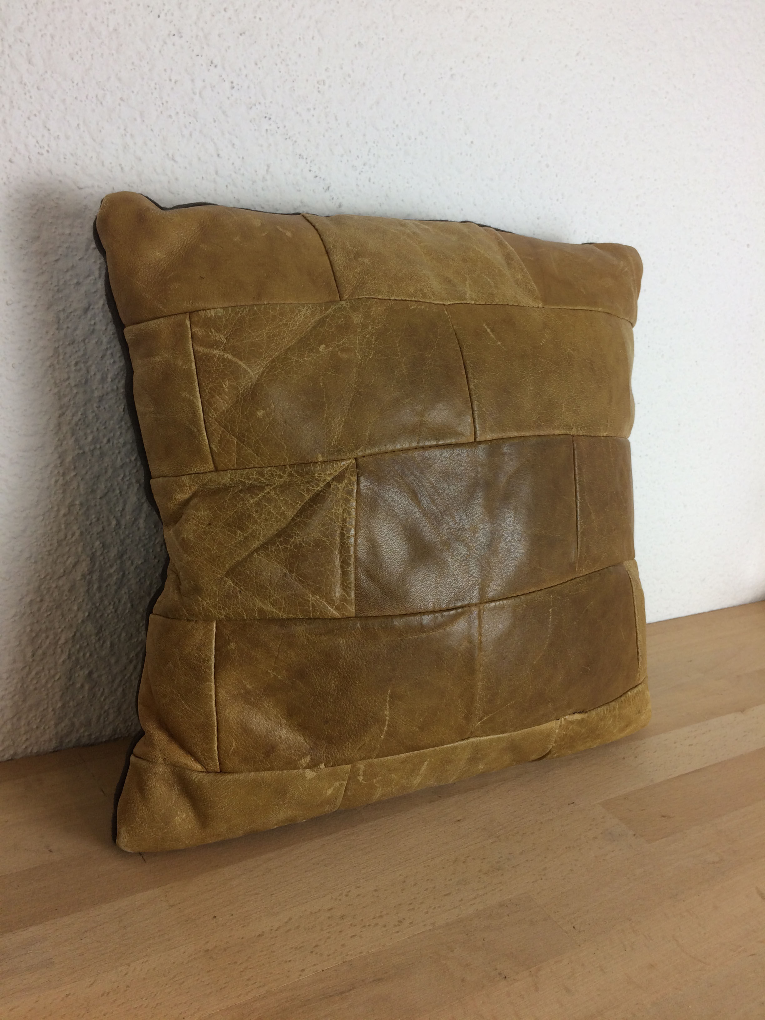 Leather patchwork cushion