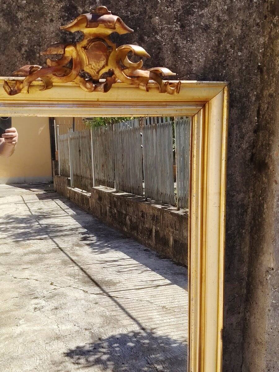 Large mirror/19th-century wooden frames, gilded.