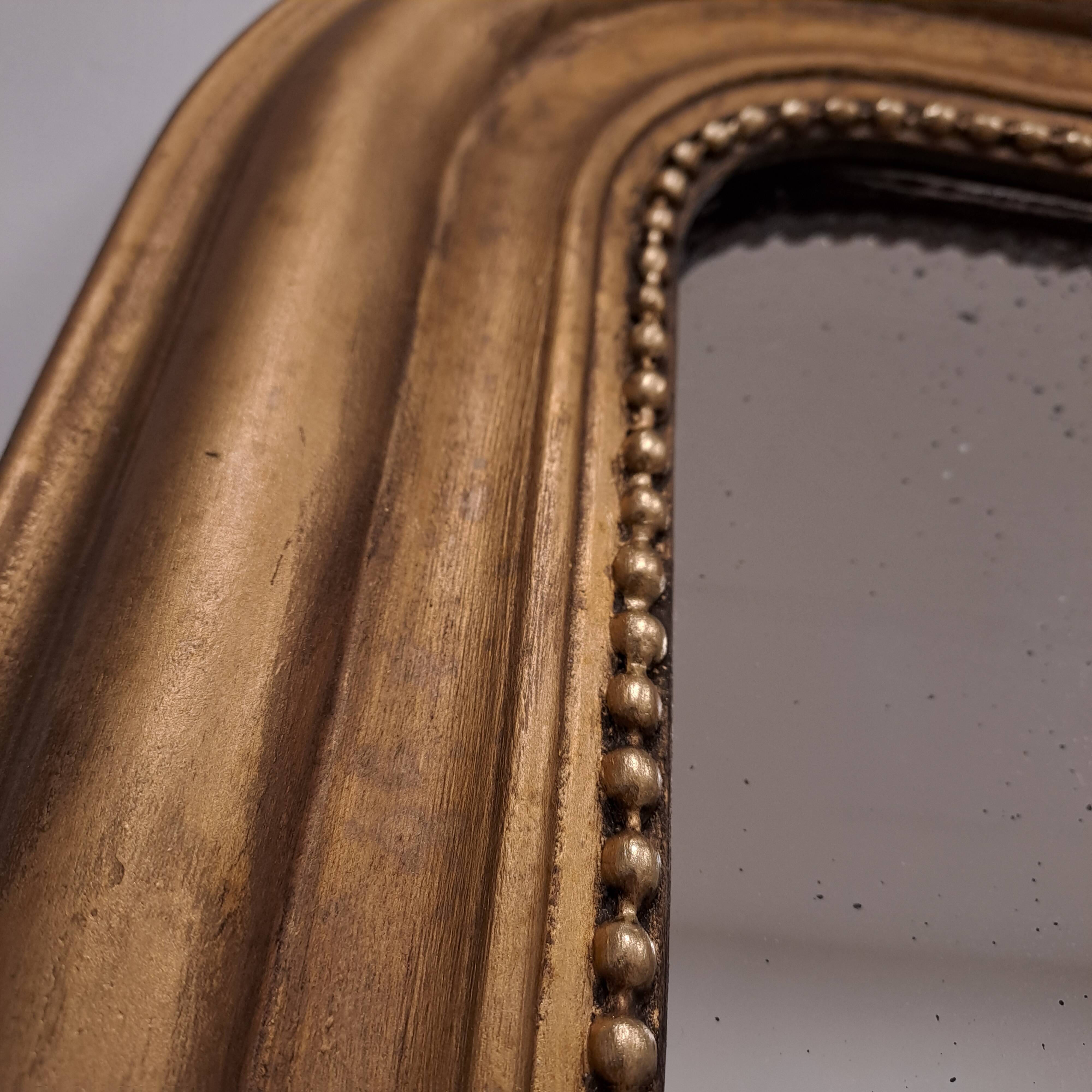 Large antique Louis Philippe gilded mirror