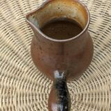 Signed stoneware pitcher