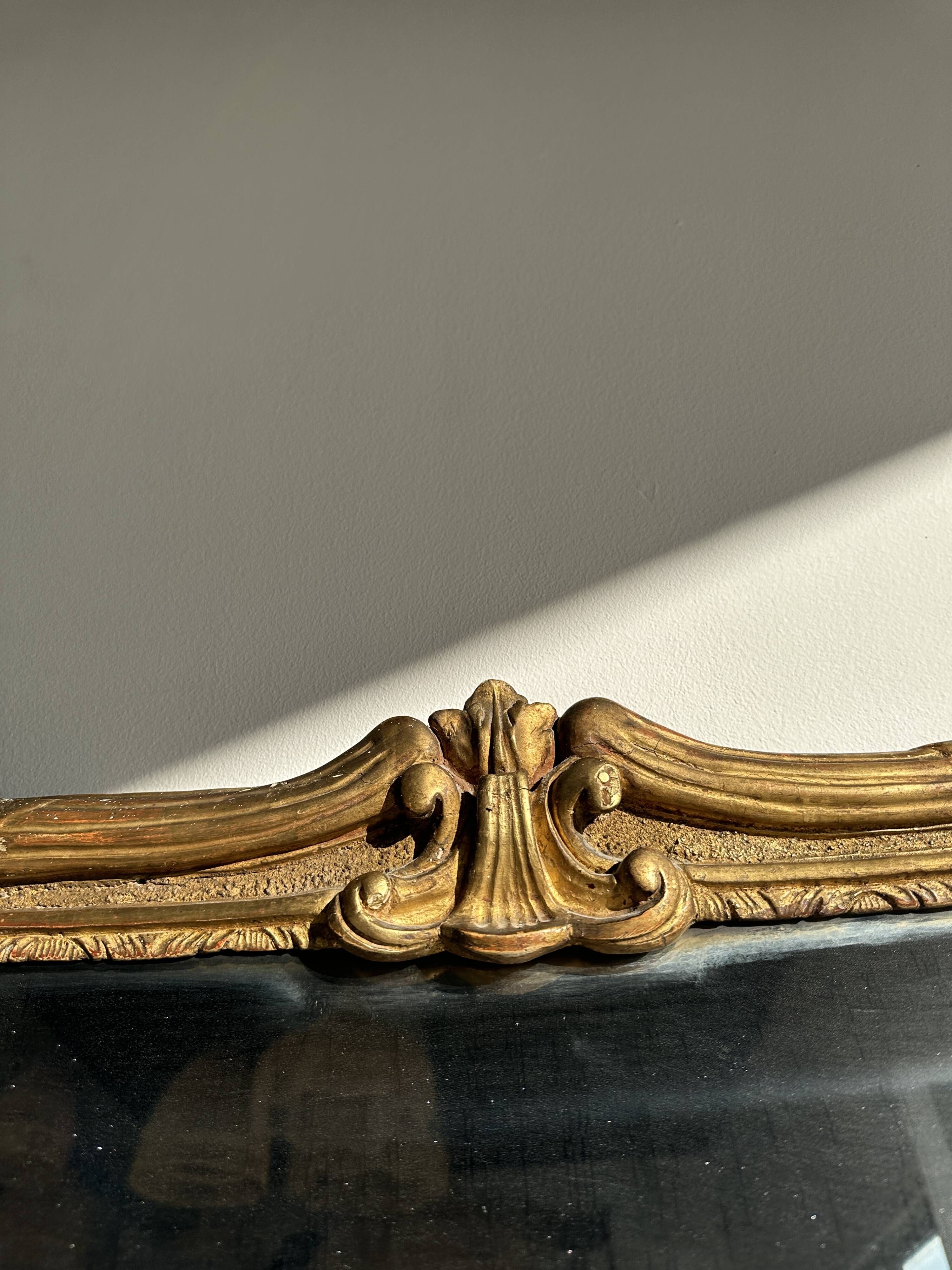 Large gilded mirror 19th century rounded corners mercury glass Louis XVI style