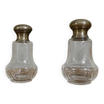 Pair of antique Louis XVI style bottles in finely engraved crystal and silver.