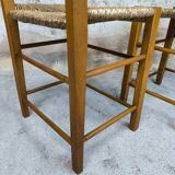 Pair of vintage wood and straw chairs