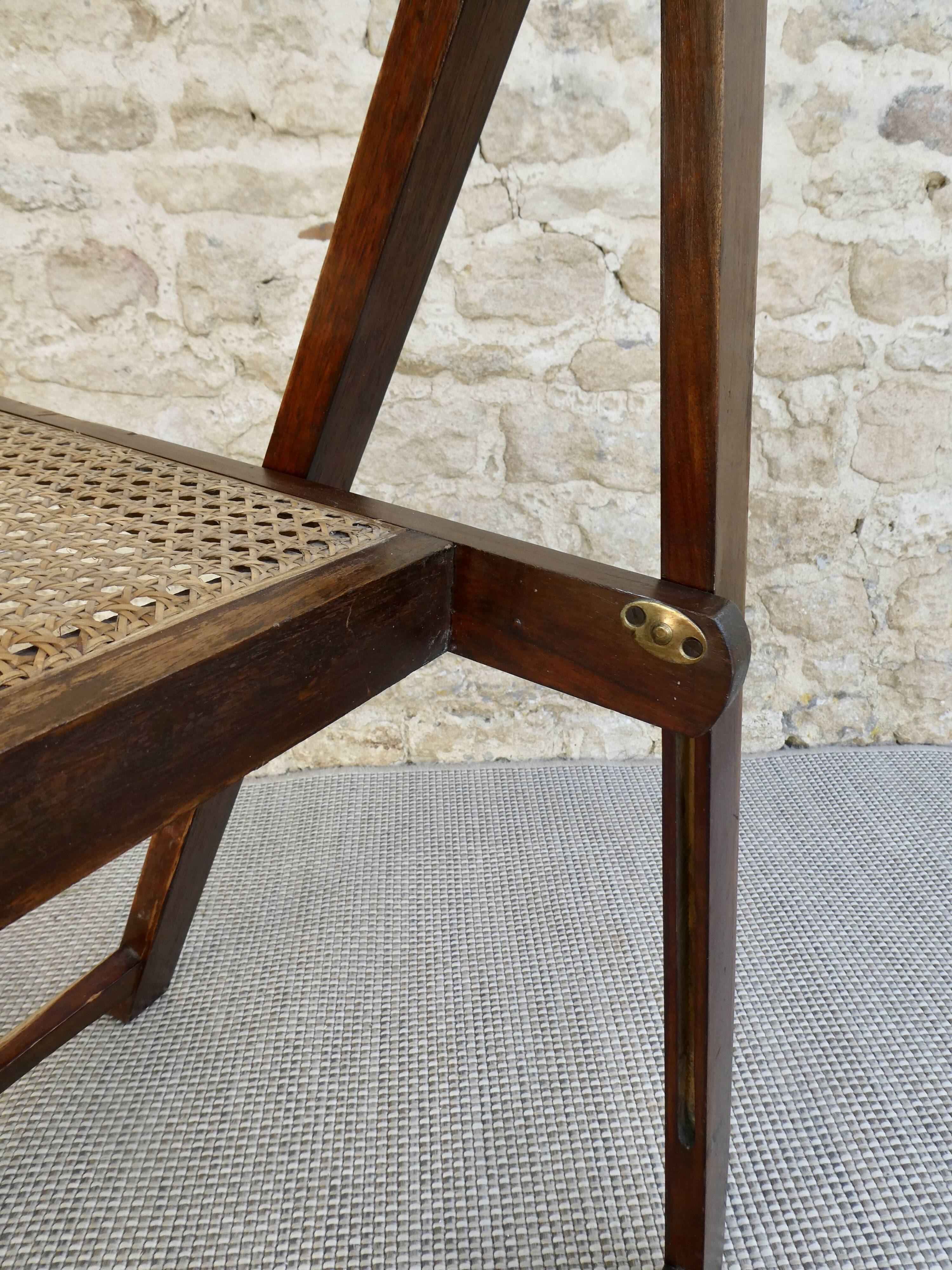 Wooden folding chair with caned seat