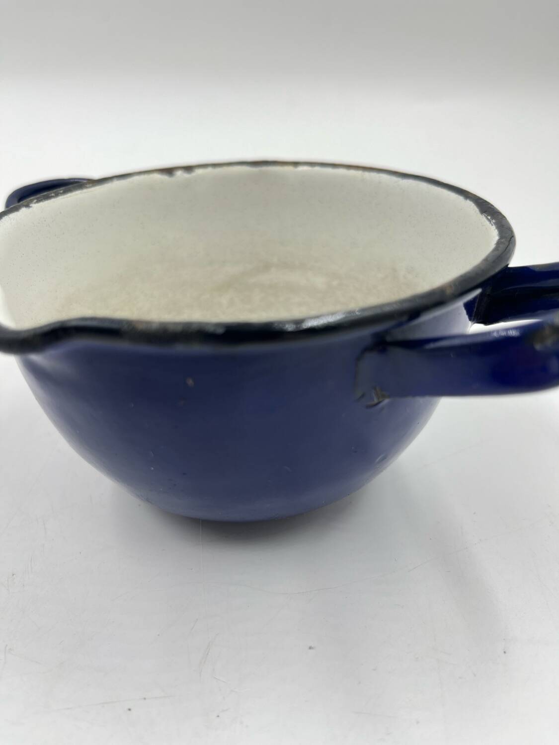 Enamelled metal fondue pot duo