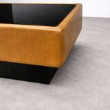 Vintage coffee table in leather and black glass – 1970s