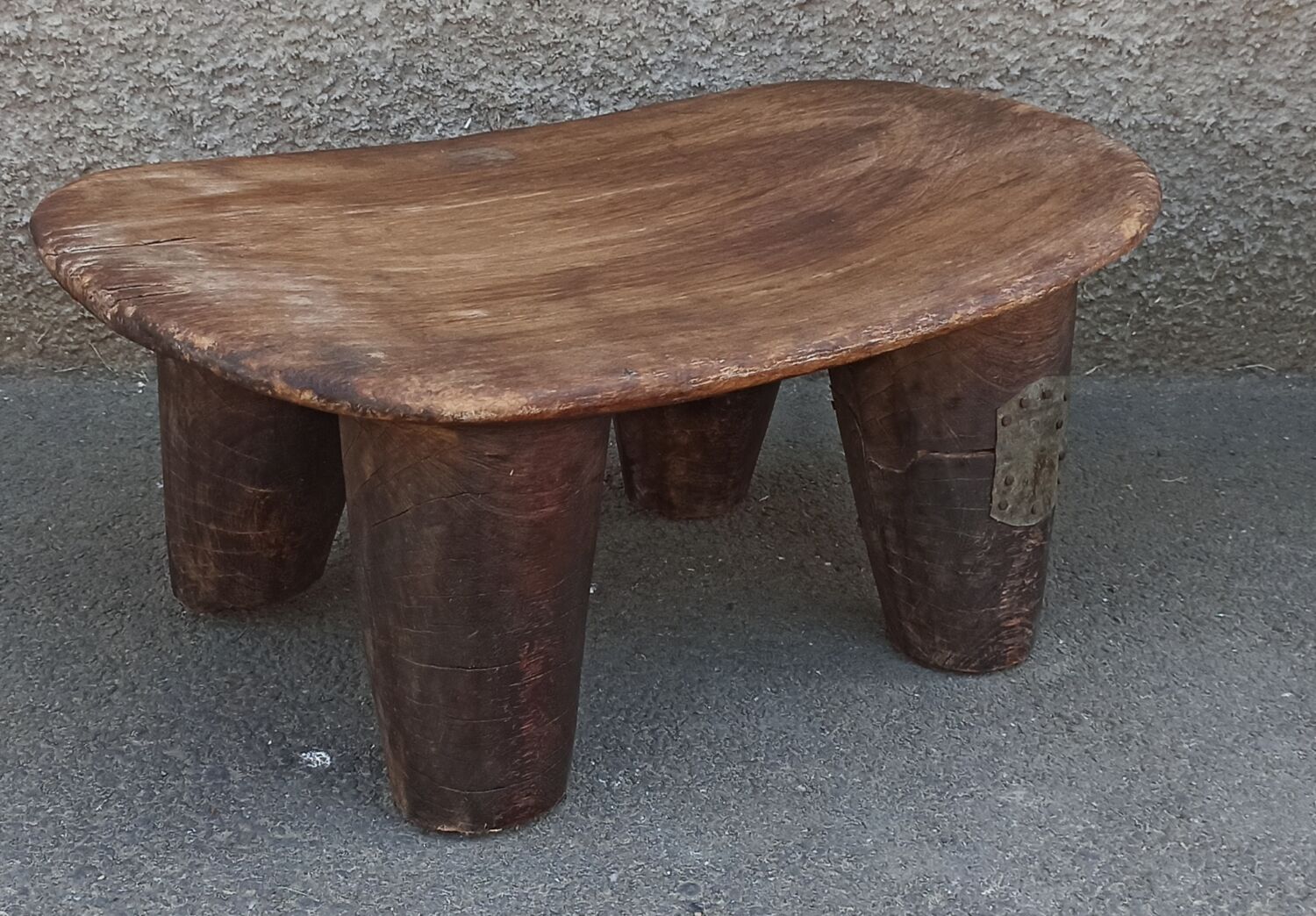 Antique wooden stool. Senufo African art from Côte d'Ivoire.