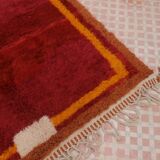 Minimalist burgundy cherry red shaggy berber rug