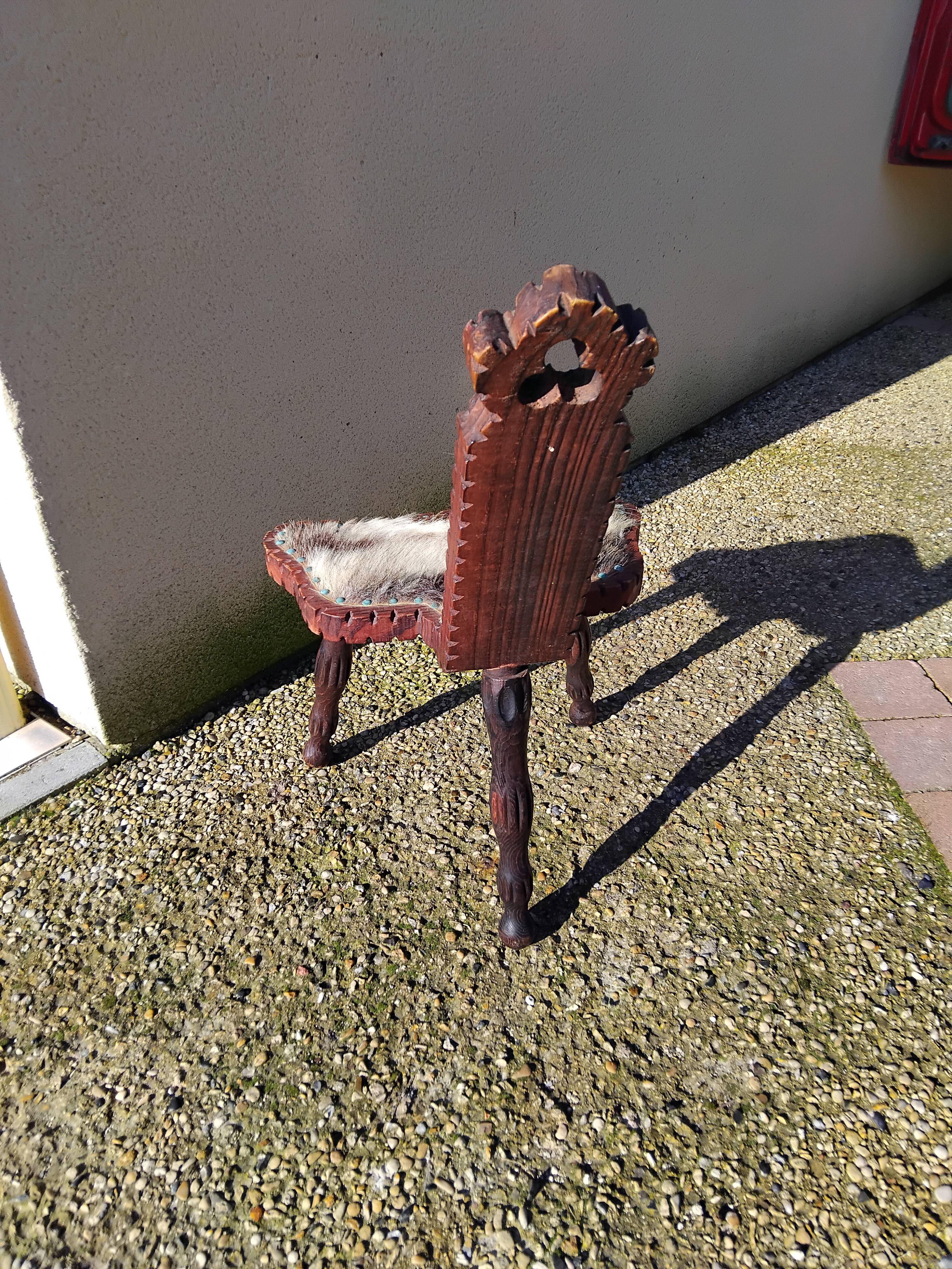 Brutalist tripod chair in wood and vintage leather