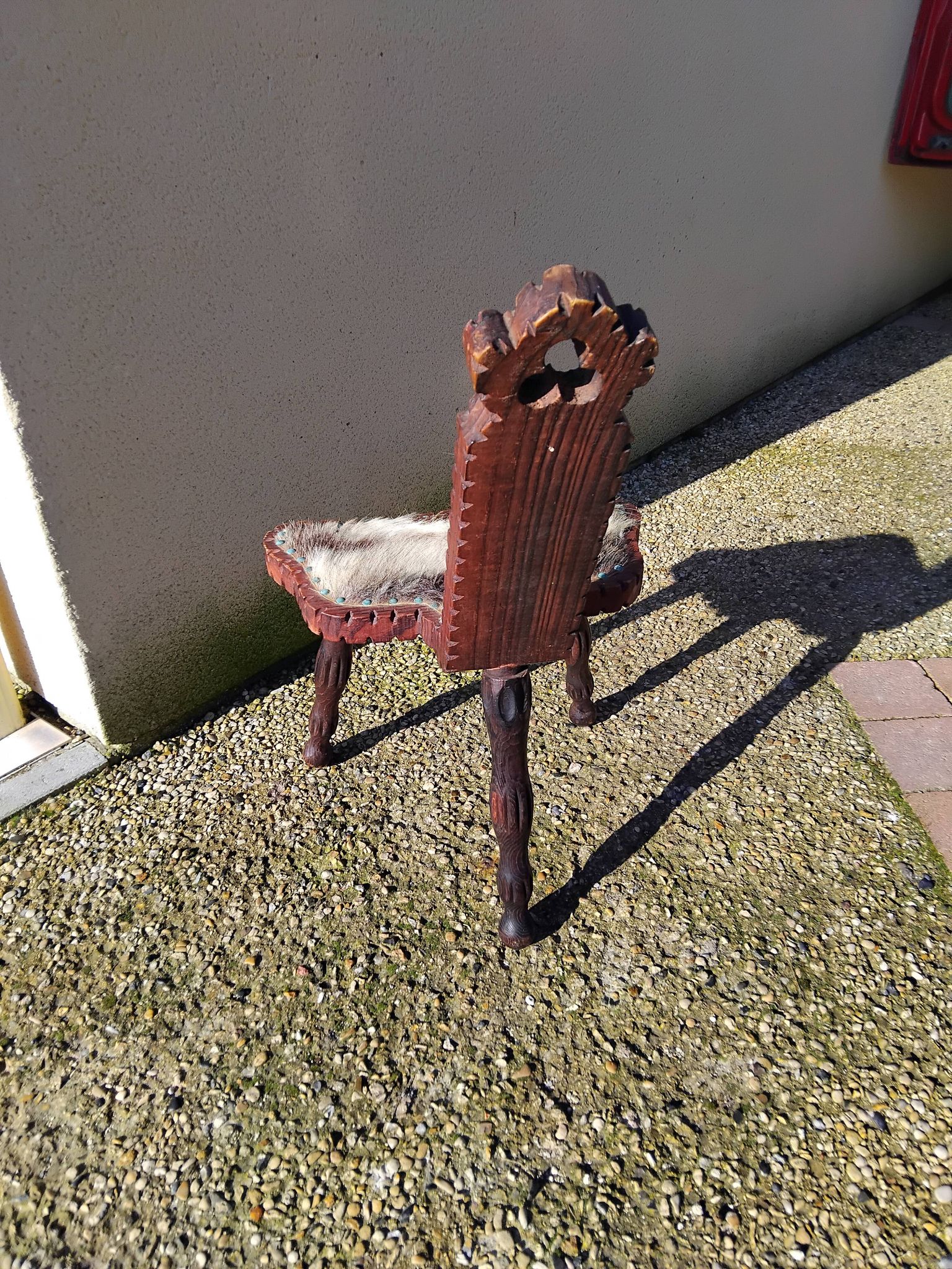 Brutalist tripod chair in wood and vintage leather