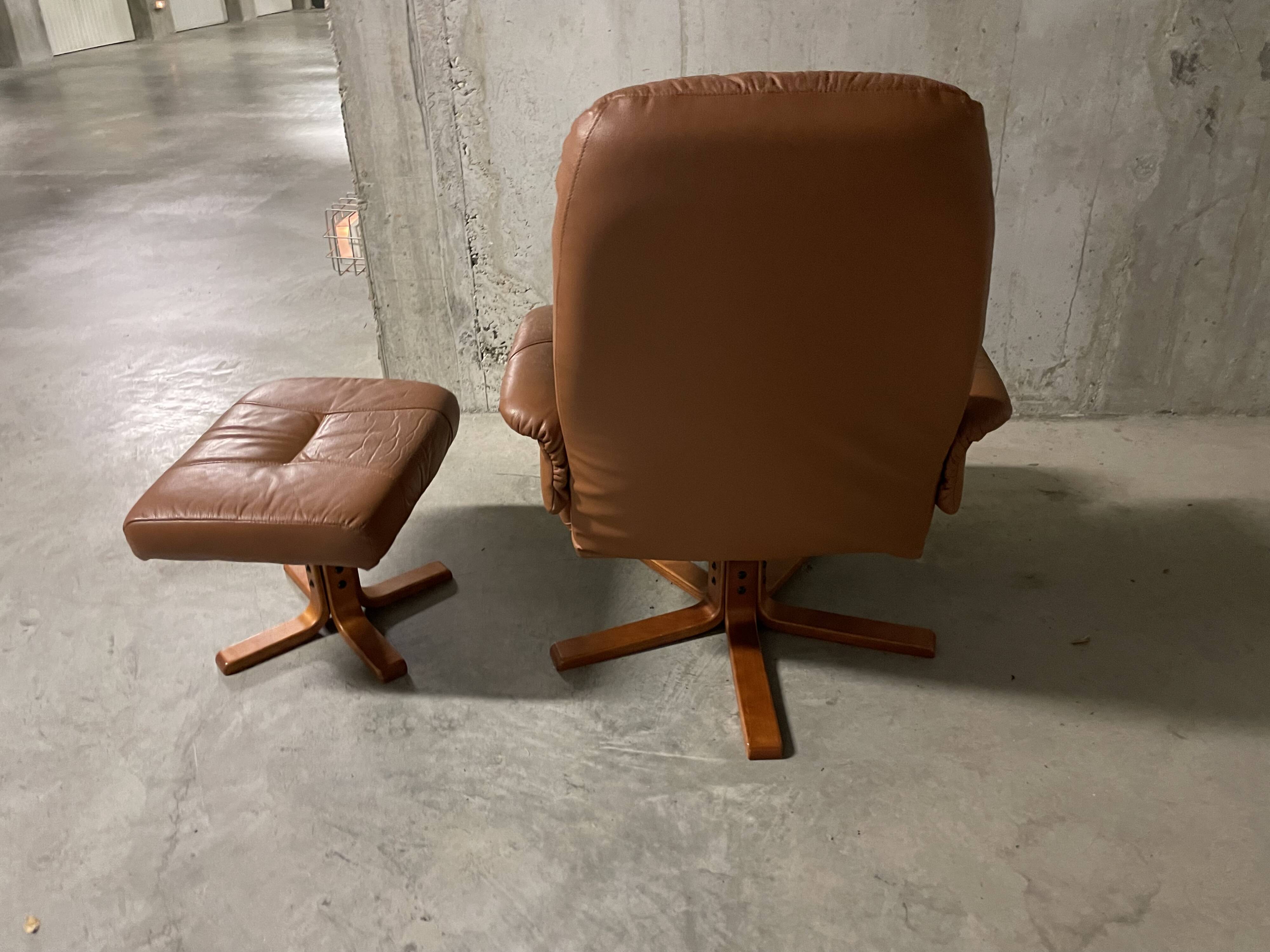 Unico leather armchair and ottoman